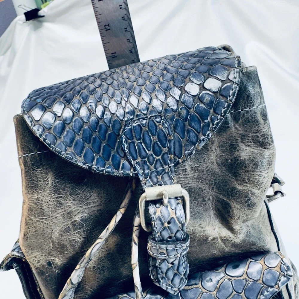 Distressed Leather Mini Backpack Blue Snake Embossed Flap Pockets Buckle Closure